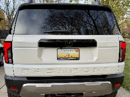 PASSPORT letters on rear hatch